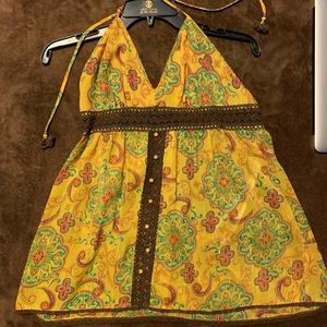 Small to medium sleeveless blouse.